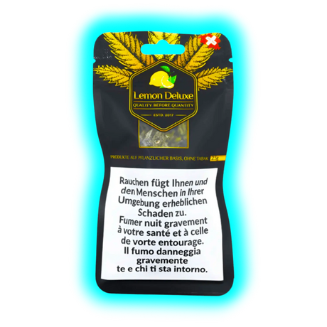 Lemon Deluxe: Packungsdesign mit Produktnamen und dreisprachigen Warnungen vor den gesundheitlichen Risiken des Rauchens.