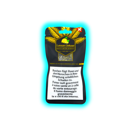 Verpackung mit dem Aufdruck 'Lemon Deluxe' und einer Warnung in mehreren Sprachen über die gesundheitlichen Schäden des Rauchens