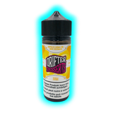 Flasche mit schwarzem Schraubverschluss und Etikett mit der Aufschrift 'DRIFTER DESSERTS VANILLA CUSTARD' und Warnhinweisen in mehreren Sprachen