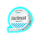 Runde Dose mit der Aufschrift 'Heimat Menthol' und einem einzelnen weißen Beutel davor