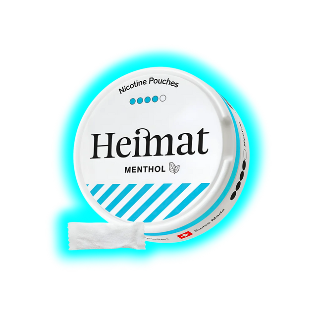 Runde Dose mit der Aufschrift 'Heimat Menthol' und einem einzelnen weißen Beutel davor