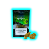 Verpackung mit der Aufschrift 'Hempiric Lemongrass Haze 2g CHF 9.90' und zwei CBD-Blüten davor, Warnhinweis in Deutsch, Französisch und Italienisch