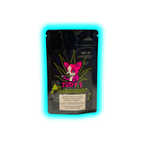 Schwarze Verpackung mit pinkem Fuchs-Logo, grünem Hanfblatt und der Aufschrift 'JUDY'S BLACKBERRY' sowie einem Warnhinweis zum Rauchen in Deutsch, Französisch und Italienisch