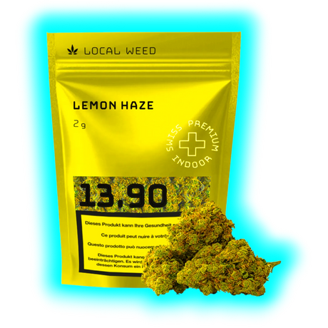 Gelbe Verpackung mit der Aufschrift 'LOCAL WEED LEMON HAZE 2g' und Preisangabe '13.90' neben zwei Cannabisblüten