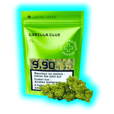 Nahaufnahme: Gorilla Glue (2g) für 9.90 CHF. Mehrere Hanfblüten präsentiert vor der farblich passenden grünen Verpackung.